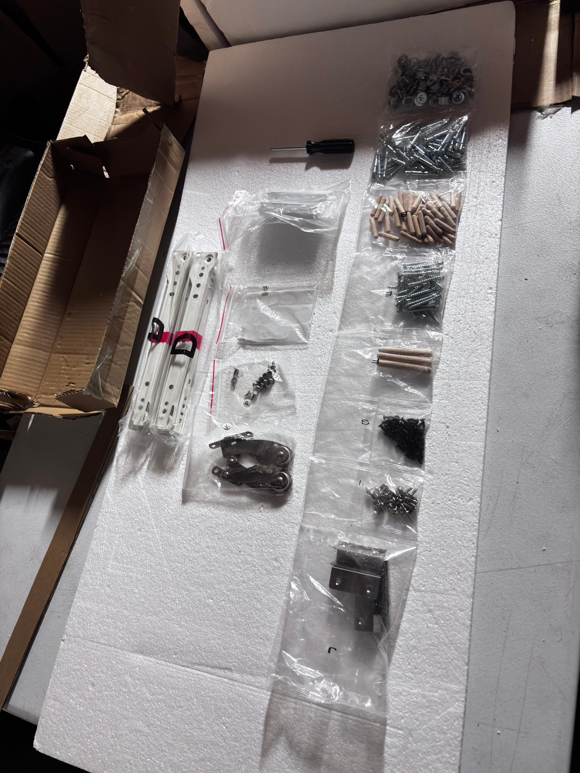 Actual WLIVE trash cabinet hardware inspected